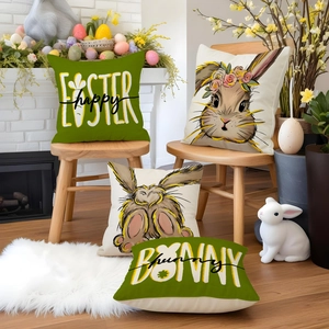 Close-up of Easter pillow covers featuring rabbit illustrations and festive Typography