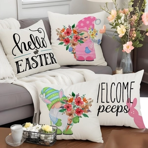 Detail showing 4-pack Easter linen pillow covers with gnomes and floral patterns on sofa