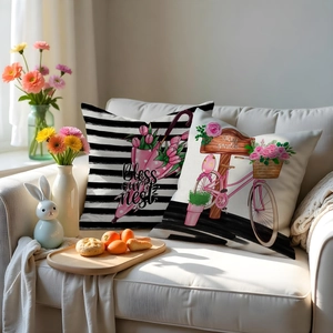Detail von Oster-Kissenbezügen mit Blumen-Fahrrad-Design auf einem gemütlichen Sofa