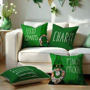 Macro detail of St. Patrick's Day linen pillow covers with gnome and clover on a sofa