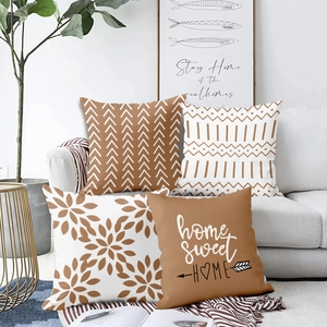 Detail of four brown and white Nordic plush pillow covers with floral and text patterns