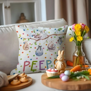 Easter throw pillow cover with bird and PEEPS print on a white fabric sofa