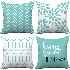 Set of 4 teal and white Nordic plush pillow covers with floral and geometric prints