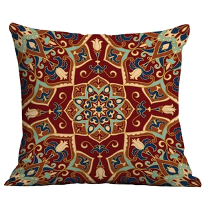 Close-up of mandala patterns and floral textures on ethnic geometric throw pillow cover