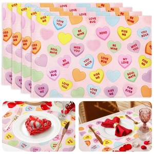 Detailed set of 4 waterproof rectangular placemats with pink Valentine heart candy patterns