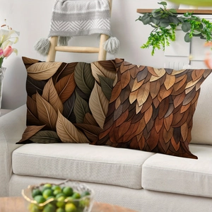 Brown leaf embossed pillow covers on white sofa in a cozy living room home decor