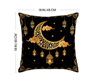 Detail of 18 inch square black and gold linen pillow case with moon and star patterns