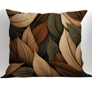 Close-up of brown embossed leaf pattern cushion cover with 3D texture and earth tones