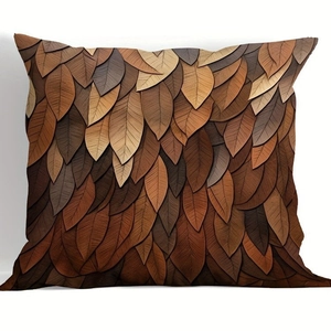 Detailed view of brown embossed leaf patterns on a modern decorative pillowcase