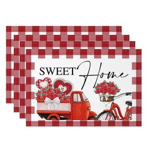 Detail of 4-piece Valentine's Day placemats featuring red vintage trucks and heart motifs