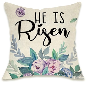 Close-up of linen pillowcase texture featuring He Is Risen Easter floral print