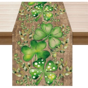 Rustic wood grain St. Patrick's table runner with green clover and shamrock leaf prints