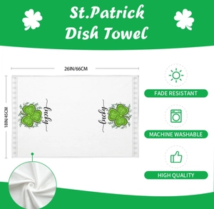 Detail of St. Patrick's Day dish towel with lucky shamrock design and 18x26 inch size