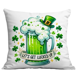Detail of St. Patrick's Day cushion cover with lucky clover and green beer cup print