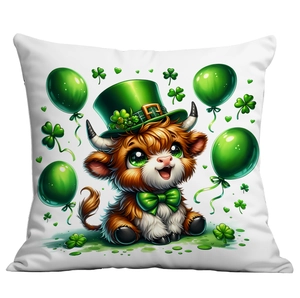 Macro shot of St. Patrick's Day cushion cover with lucky highland cow and shamrocks