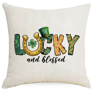 Close-up of linen pillowcase with green St. Patrick's Day Lucky and Blessed print
