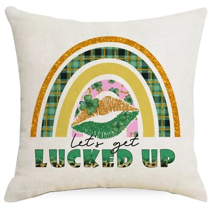 Close-up of linen pillowcase with green clover and let's get LUCKED UP text design