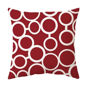 Detail of burgundy geometric ring pattern on modern minimalist cotton linen cushion cover