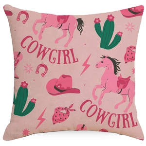 Close-up of pink cowboy pillowcase featuring horse, cactus, and Cowgirl lettering