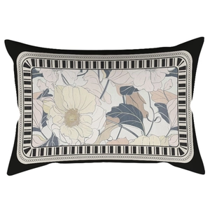 Detailed close-up of velvet cushion with retro magnolia embroidery and striped border