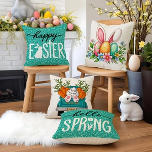 Detail showing four Easter pillow covers with bunny and floral prints in a cozy home setting