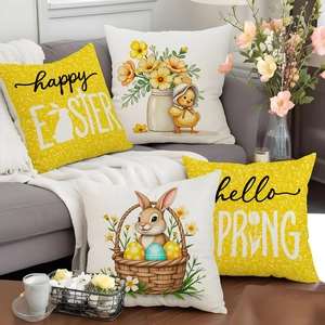 Set of 4 linen Easter cushion covers with bunny and spring floral prints on a gray sofa