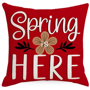 Red linen texture throw pillow cover with white floral print and Spring Is Here text