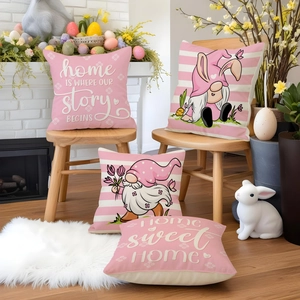 Detail showing Easter pillow covers with pink stripes and cute gnome patterns on sofa