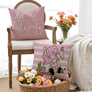 Close-up of Easter gnome pillow covers with pink stripes and home story typography