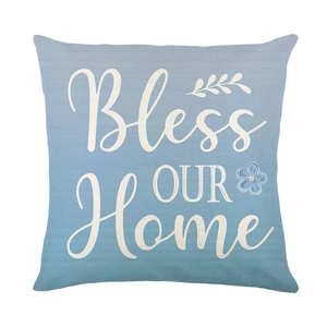 Light blue linen pillowcase with floral print and Bless OUR Home text decoration