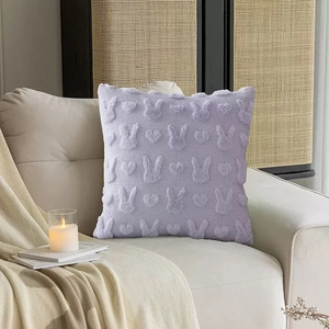 Detail of lavender Easter bunny throw pillow with 3D heart and rabbit plush embroidery