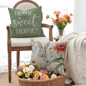 Dettaglio delle federe pasquali con motivi di coniglietti e scritta Home Sweet Home