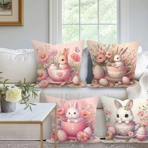 Set of four cartoon rabbit pillow covers displayed on a white sofa in a cozy living room