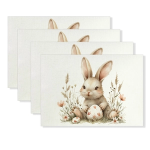 Set of 4 Easter linen placemats featuring a cute bunny holding eggs and floral patterns