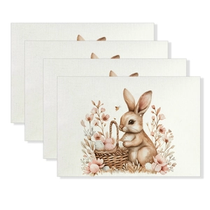 Detailed view of 4-piece Easter linen placemats with watercolor bunny and egg illustrations