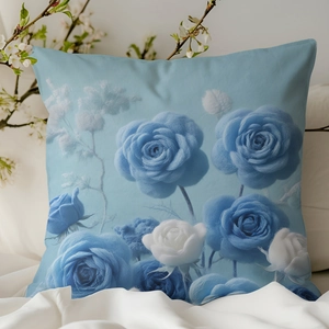 Housse de coussin carrée rose bleue 3D avec texture en peluche sur une literie blanche