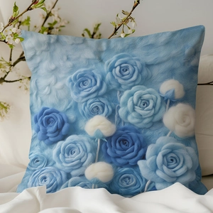 Détail d'une taie d'oreiller 3D en peluche avec rose bleue et texture douce sur lit