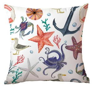 Close-up of nautical ocean life prints including octopus and anchor on white pillowcase