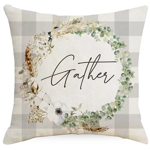 Linen pillow cover with buffalo check background, floral wreath and Gather typography