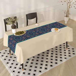 Bohemian mandala table runner with fringe on beige fabric for ethnic home dining decor