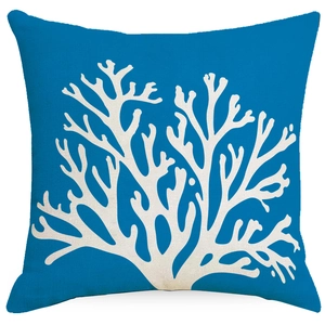 Close-up of blue linen pillow cover featuring white coral pattern and fine fabric texture