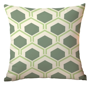 Detailed view of square pillowcase with green and beige interlocking honeycomb patterns