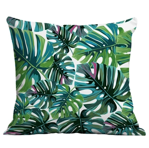 Detail of tropical monstera leaf digital print on high-quality square pillow case