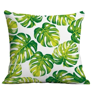Detailed view of square pillow cover featuring tropical monstera leaf print on white fabric