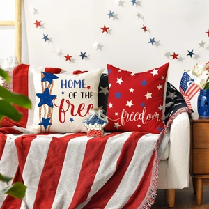 Patriotic Independence Day decor set with star pillows and red-white striped knit blanket