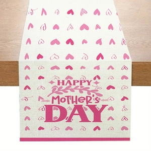 Close-up of Mother's Day table runner fabric with pink hearts and floral lettering