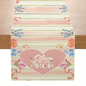 Detailed close-up of Mother's Day table runner with floral heart and Olive you MOM text