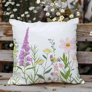 Dettaglio della federa per cuscino con stampa floreale e fiori colorati sulla panca