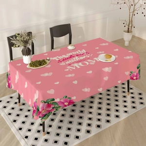 Macro shot of waterproof polyester tablecloth with pink floral patterns and Mom lettering