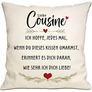 Close-up of linen pillowcase with German text for cousin and red heart pattern